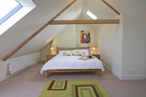 Attic bedroom 3 with a king size bed, is a snug and cosy hideaway