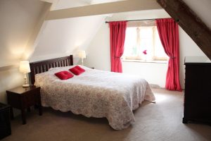 Cosy bedroom tucked in the eaves