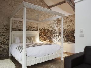 Peaceful extra bedroom accommodation in the barn rooms for larger groups hiring Devon Farmhouse through The Big House Company