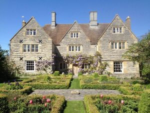 Cotswolds Manor is a honey coloured large manor house with beautiful gardens and lots of original features