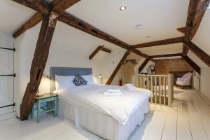 Bedroom 7, a charming, cosy room with 2 extra single beds. Great as a family bedroom