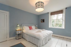 Bedroom 3, decorated in pretty pale pastels has a superking bed