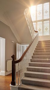 Impress your group of friends with this grand staircase and hallway.