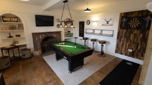 The games room for hours of fun playing pool. Perch on the bar stools and enjoy the action