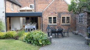 The dining room with bi-fold doors to the terrace