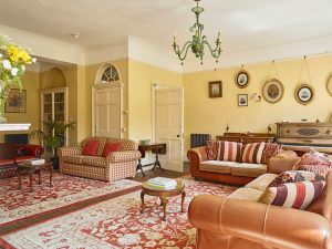 Tone Dale House - the elegant drawing room has large windows overlooking the garden