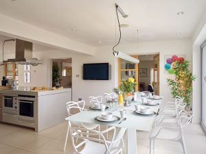 The breakfast table looks out towards the terrace