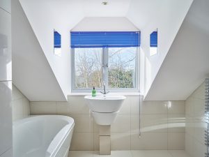 Bedrooms 5 & 6 share this sleek bathroom