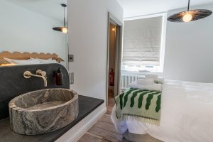 Bedroom with circular sink in Cornwall